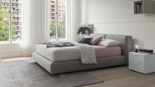 Letto con contenitore in tessuto imbottito con testiera Free di Morassutti