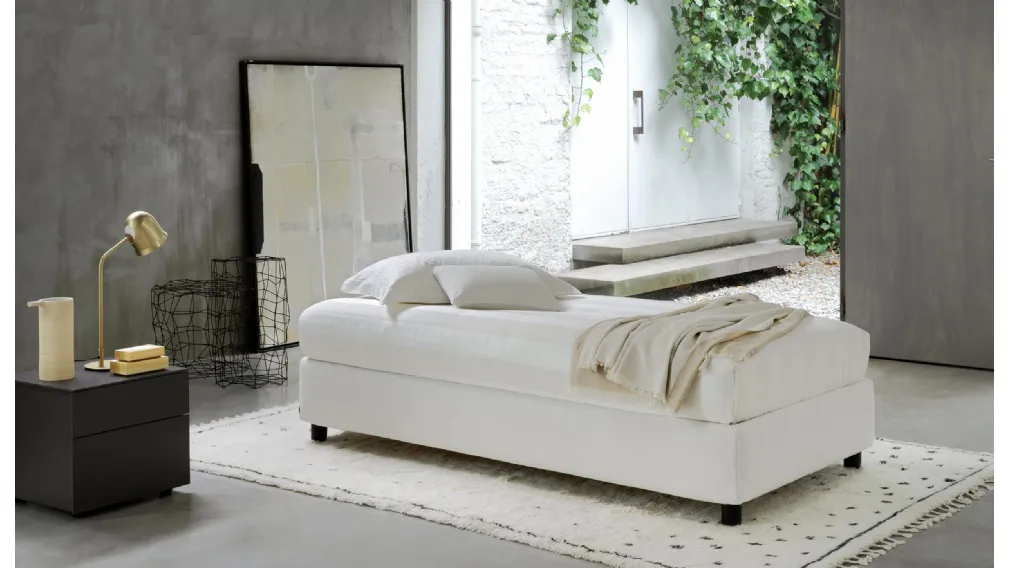 Letto essenziale in tessuto Sommier Singolo con contenitore di Flou