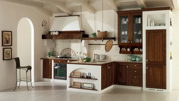 Cucina in muratura Rustica in legno con penisola di Ar-Tre